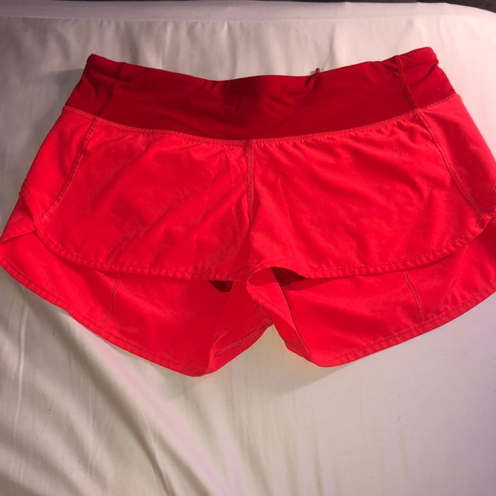 lululemon neon orange speed up shorts
